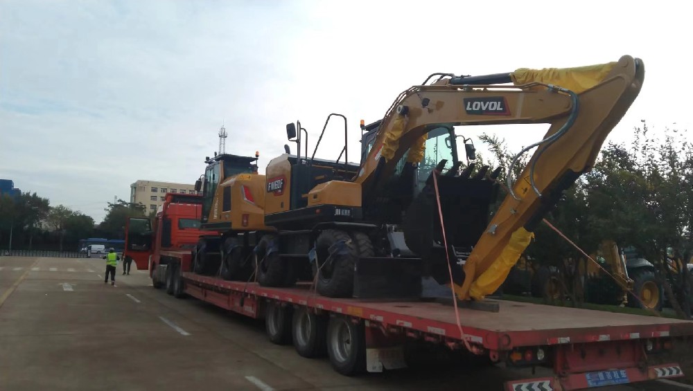 青岛淳远国际物流有限公司——专业大件运输解决方案_青岛港到天津港口岸挖机运输_青岛港到天津港口岸装载机运输